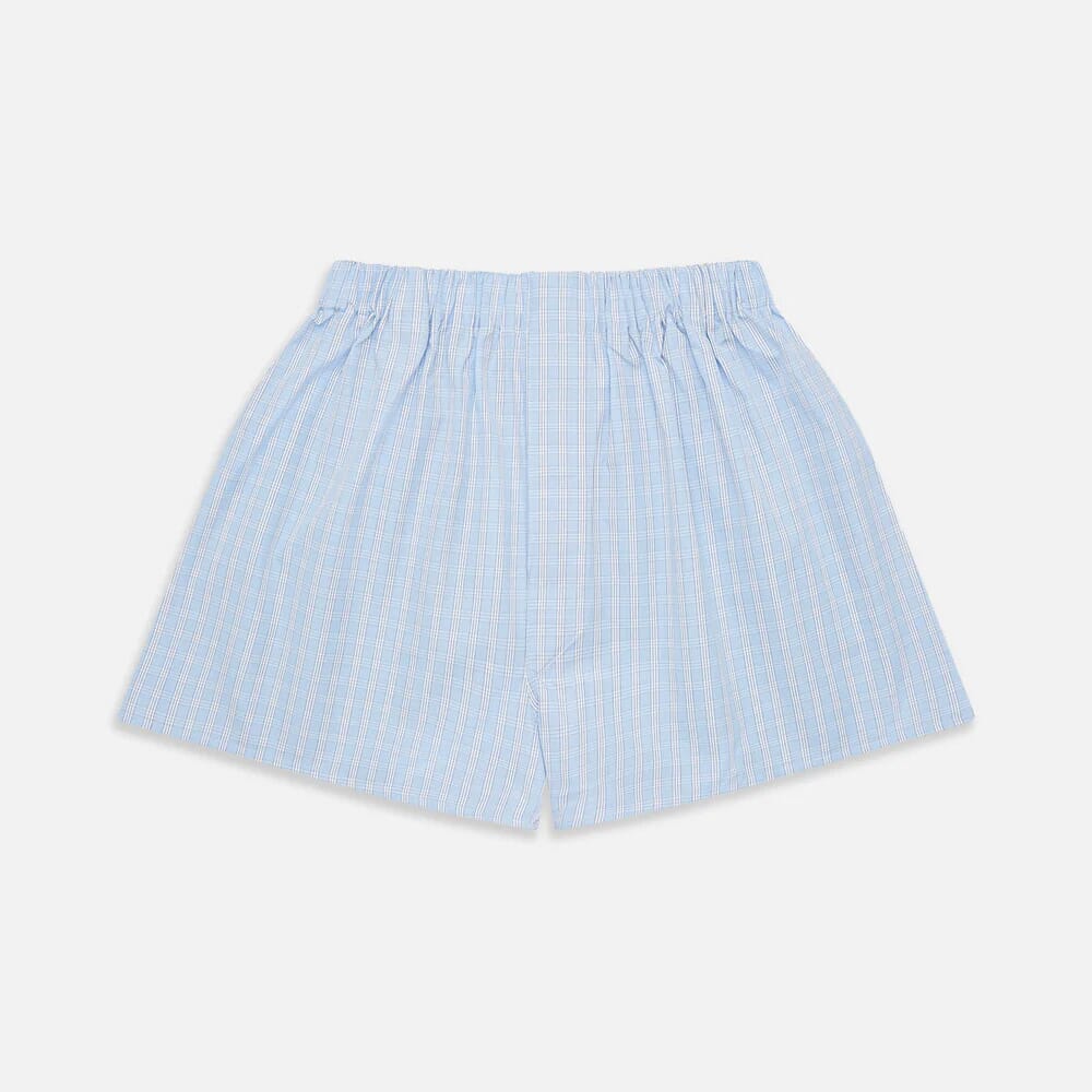 Light blue plaid boxer shorts with an elastic waistband displayed flat on a white background.