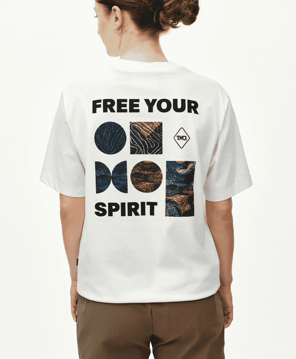 Back view of the 'FREE YOUR SPIRIT' white oversized T-shirt with abstract prints.