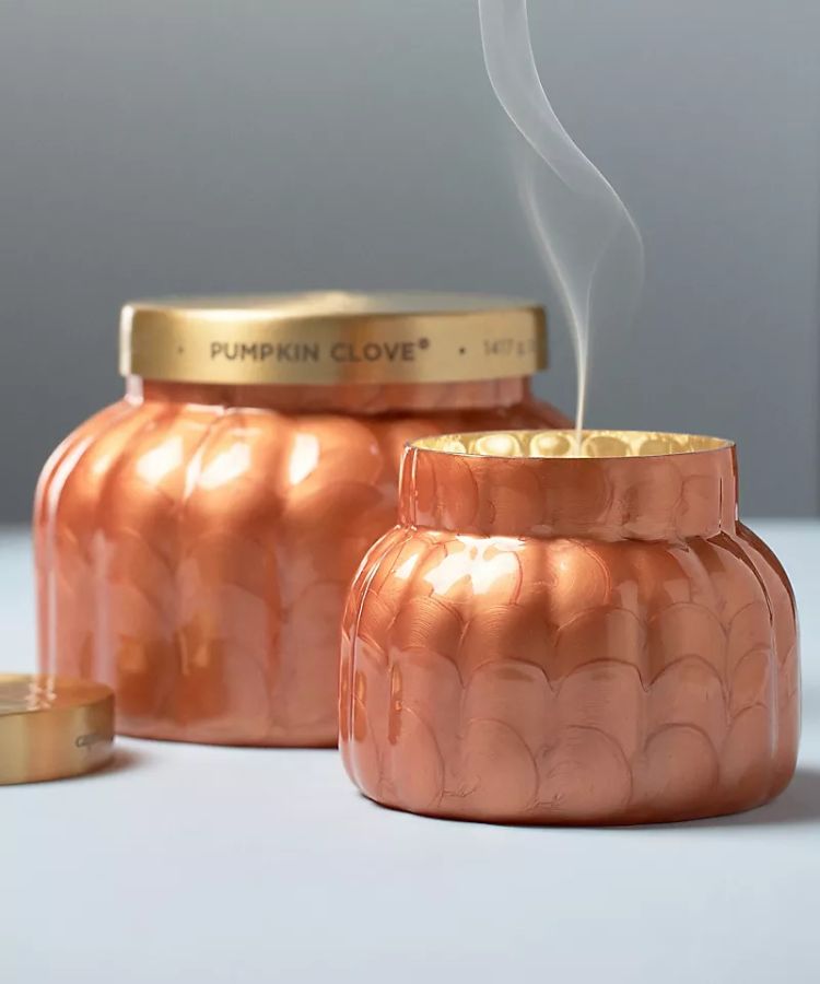 Textured amber glass jar of the Capri Blue Pumpkin Clove Candle.