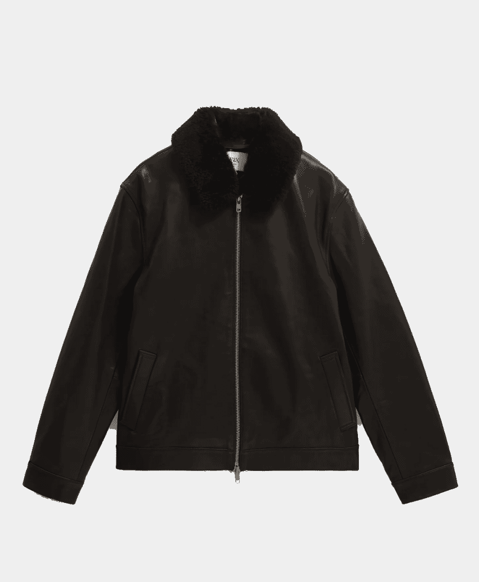 A black shearling-lined bomber jacket displayed flat.