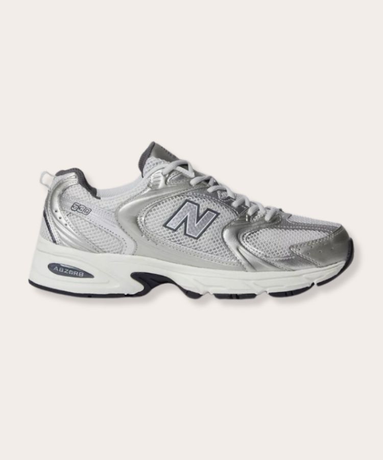 New Balance 530 athletic lifestyle sneakers in white and silver.