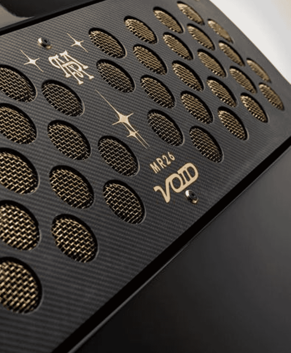 Carbon fiber audio grille with 'VOID MR26' branding and gold mesh.