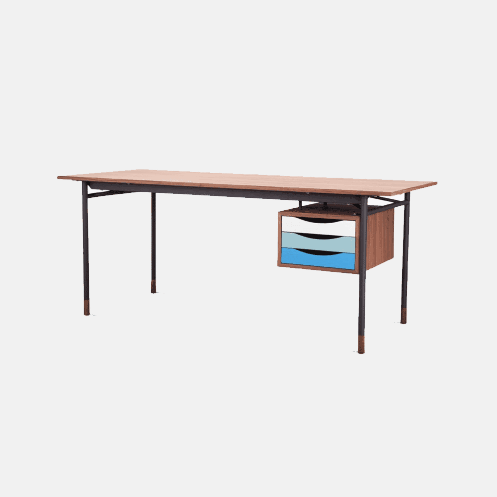 Modern desk featuring a side cabinet with white, teal, and blue modular drawers.