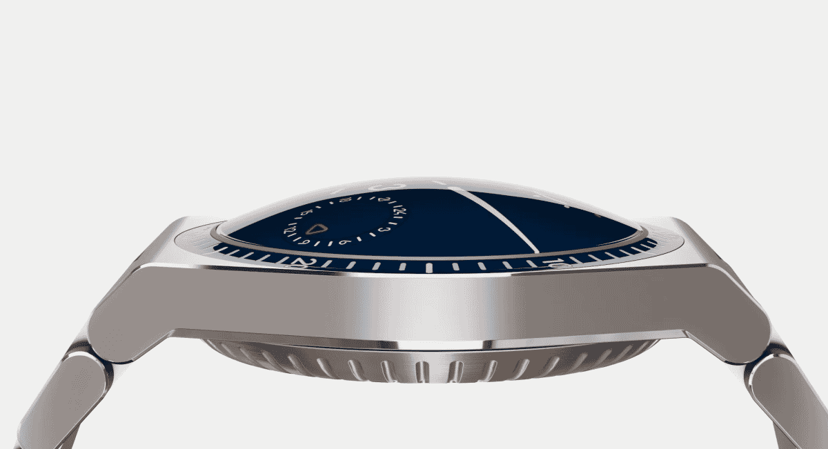 Side profile of a polished Grade 5 titanium watch case with an integrated metallic bracelet and blue dial.