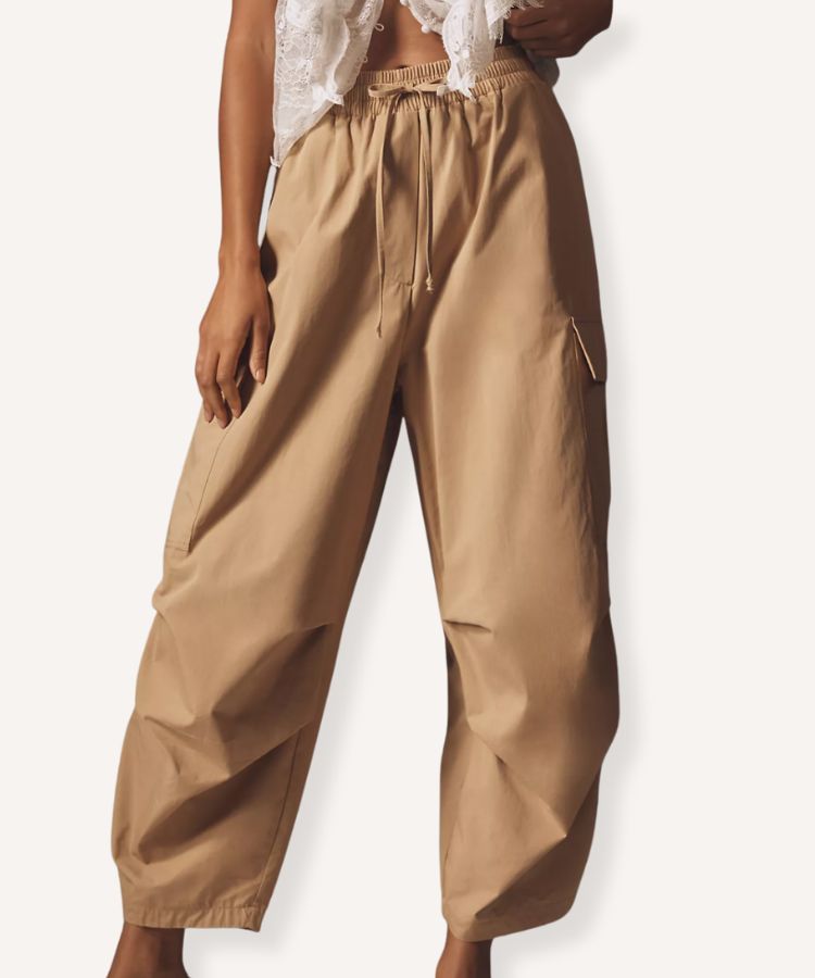 Oversized utility-style trousers in a neutral tan color.
