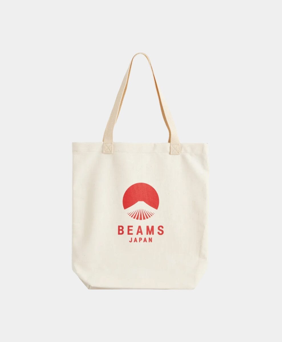 Cream-colored canvas tote bag featuring a red BEAMS JAPAN mountain logo.