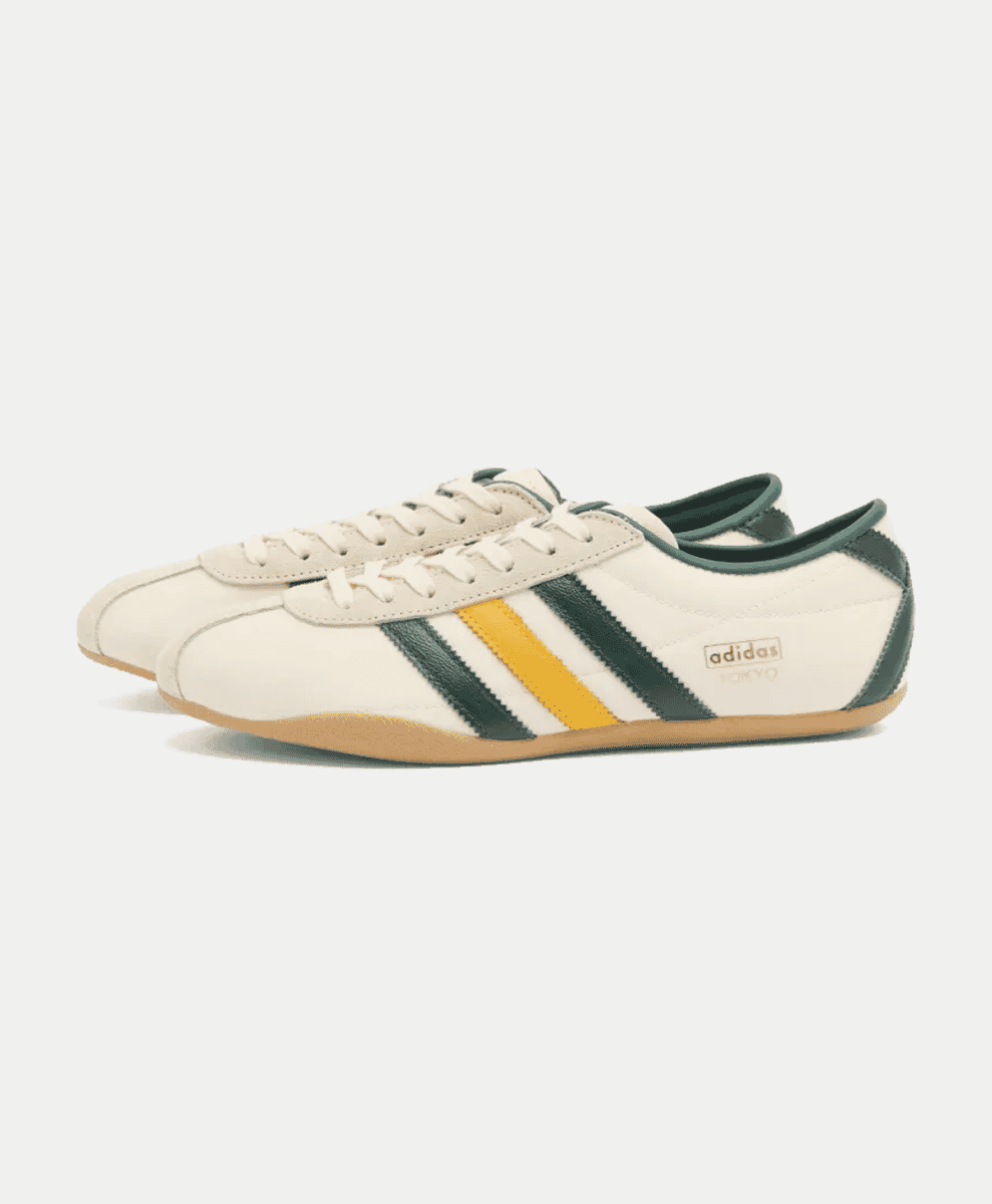 Adidas Tokyo sneakers in cream and green with a gum rubber sole.