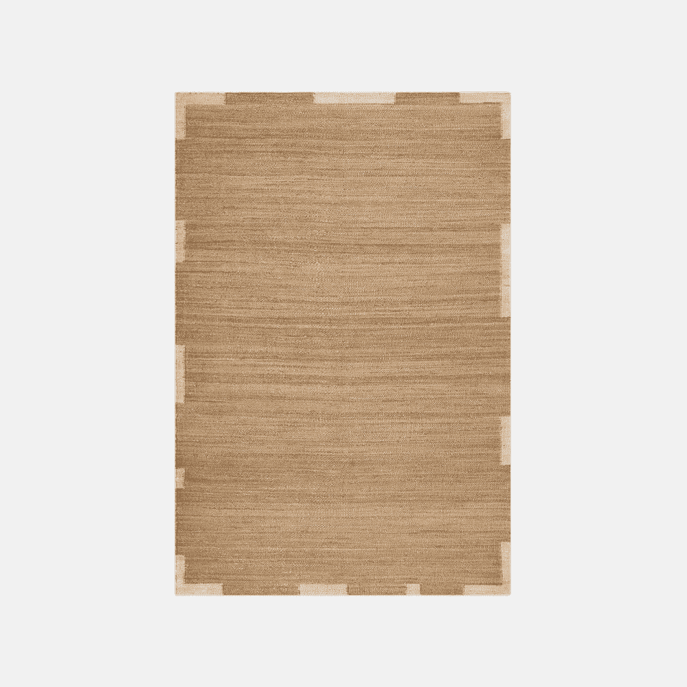 Rectangular beige rug with a textured weave and geometric border.