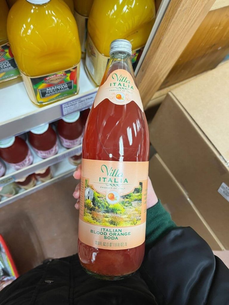 Glass bottle of Trader Joe's Italian Blood Orange Soda.
