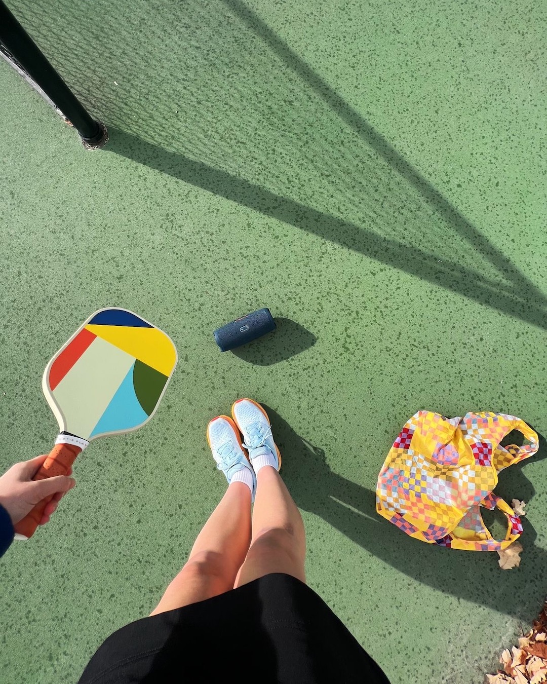 A travel-inspired lifestyle photograph featuring a person preparing for or enjoying a getaway.