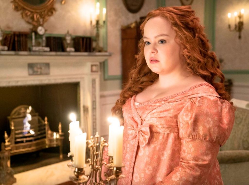 Colin Bridgerton in travel-appropriate gentleman's attire looking charming