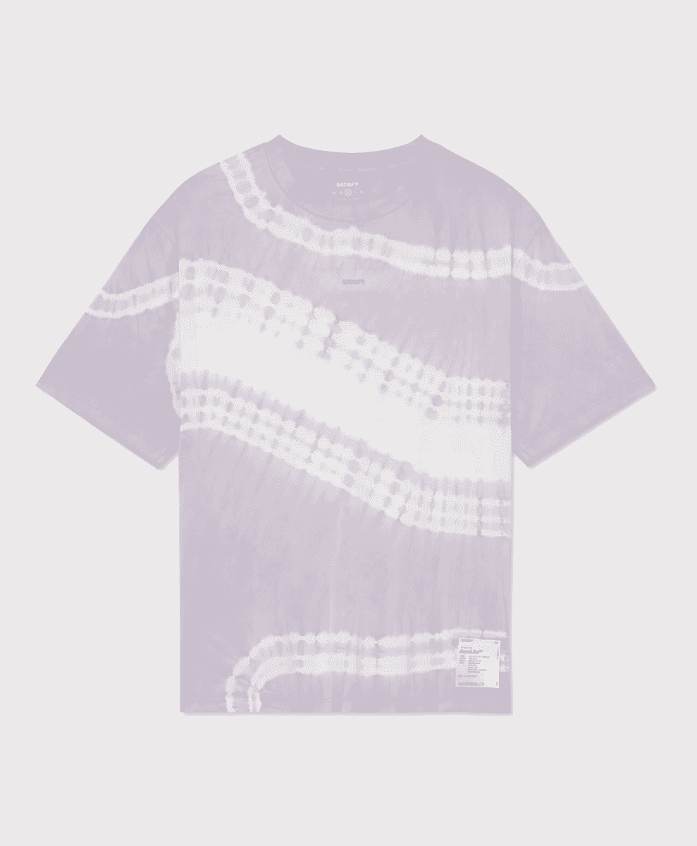 A light purple tie-dye T-shirt with abstract white patterns against a plain background.