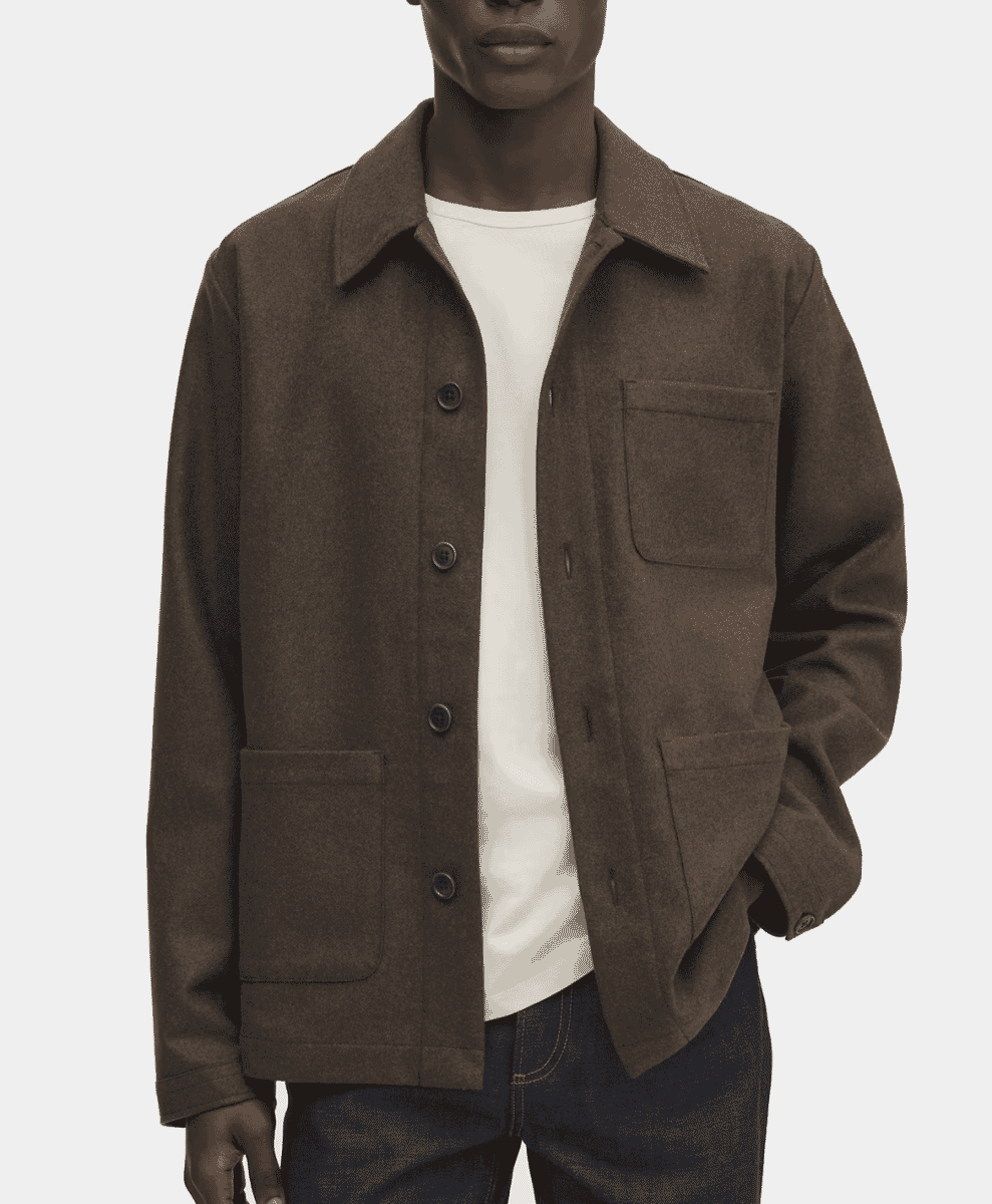 A model wearing a brown wool field jacket with patch pockets.
