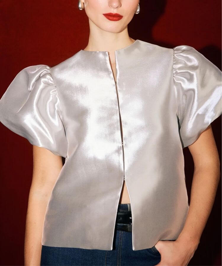 Silver metallic puff sleeve top by Aligne