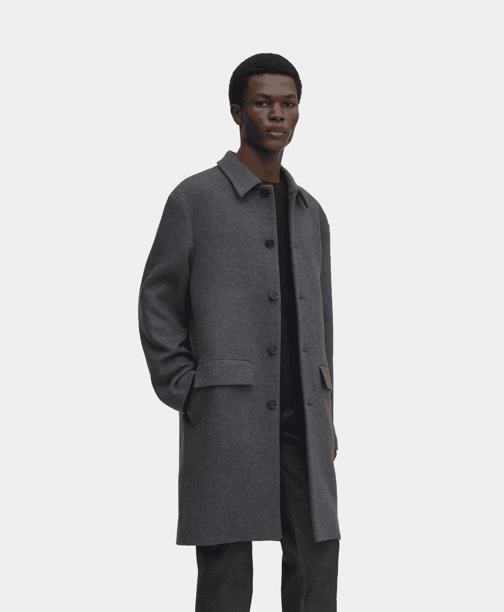 Front view of a charcoal gray wool overcoat with a classic collar.
