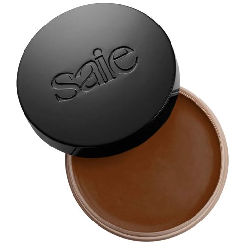 Saie Sun Melt Cream Bronzer in a round container.