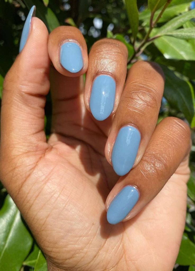 Creamy sky blue manicure with a smooth finish.