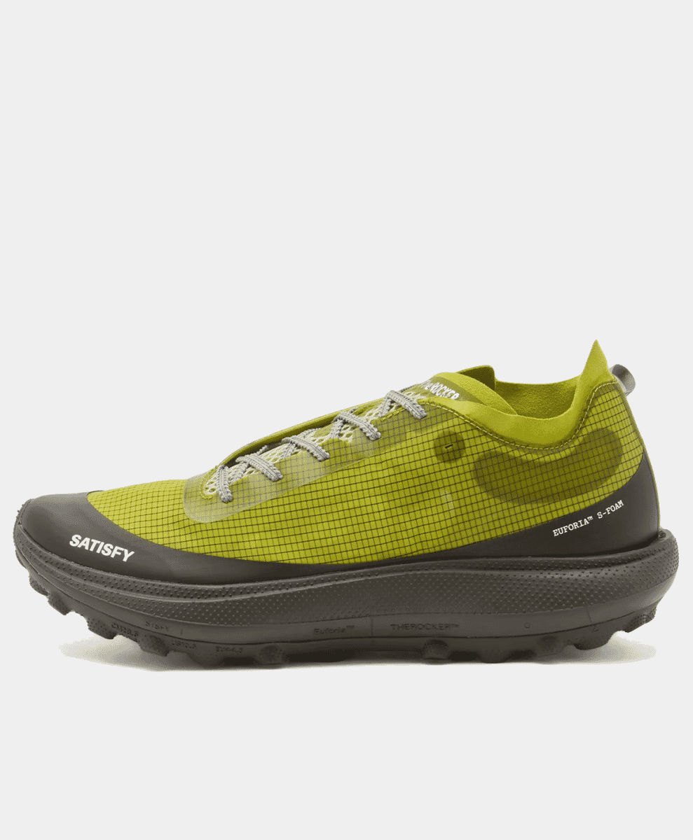 Satisfy lime green mesh trail sneaker with a rugged black sole.
