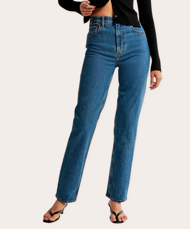 Model wearing Abercrombie high-rise 90s jeans in a light blue wash.