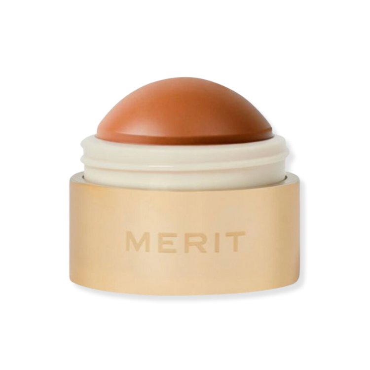 Merit Flush Balm in the earthy shade Terracotta.
