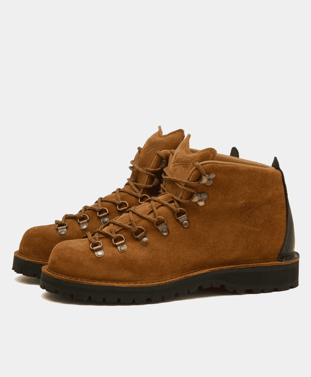 A pair of brown suede Danner Mountain Light boots.