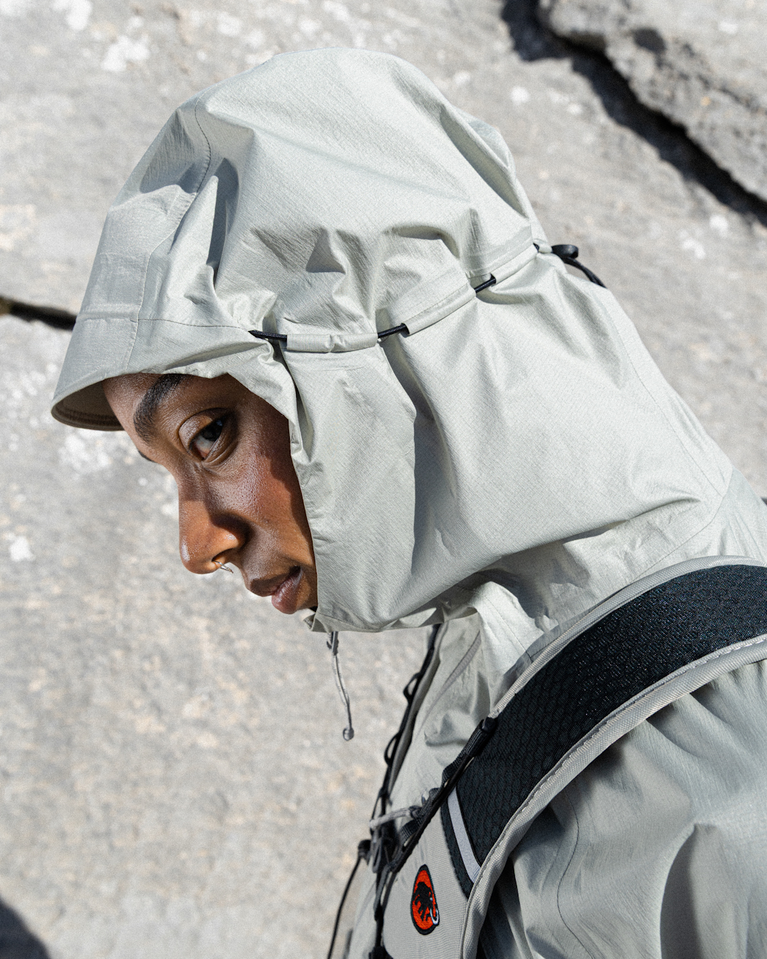 Detail shot of the organic seamlines and integrated storage pockets on the Aenergy jacket.