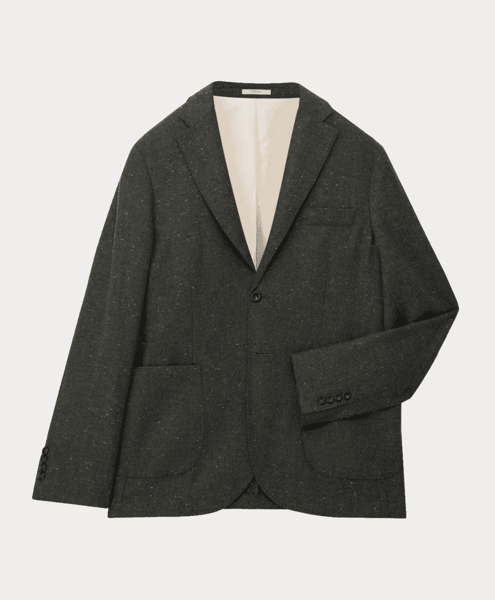 A flat lay of a dark gray textured wool blazer with notched lapels.