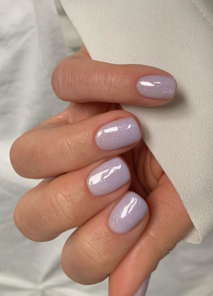 Manicure featuring a subtle soft shimmer top coat.
