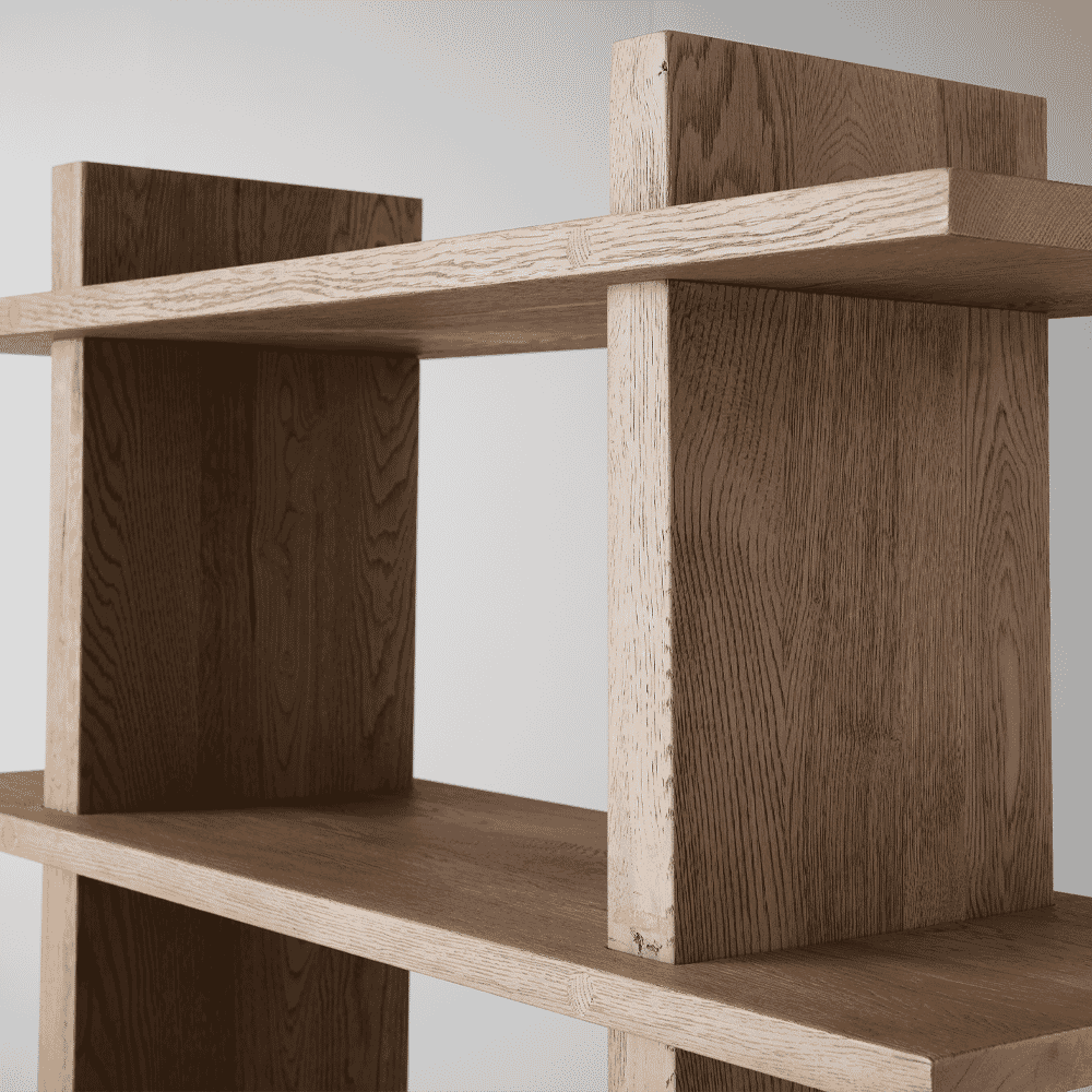Close-up detail of high-quality wood grain and clean joints on a minimalist bookshelf.