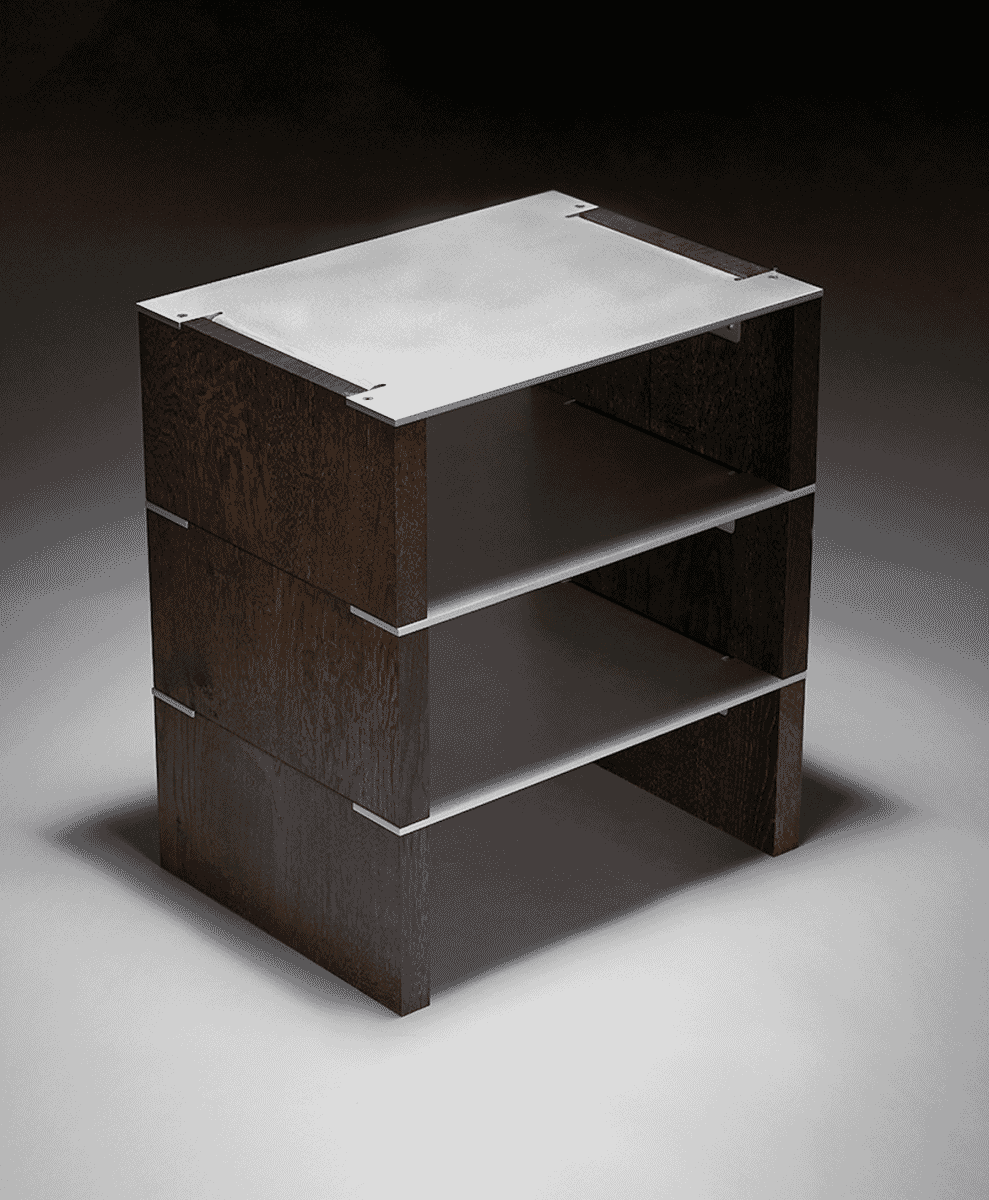 A minimalist modern side table with dark wood panels and metallic silver shelves in a studio setting.