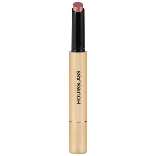 Hourglass Volumizing Glossy Lip Balm in a sleek gold applicator.