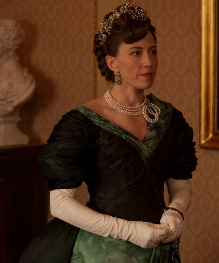 High-glam stage performer in a showgirl costume