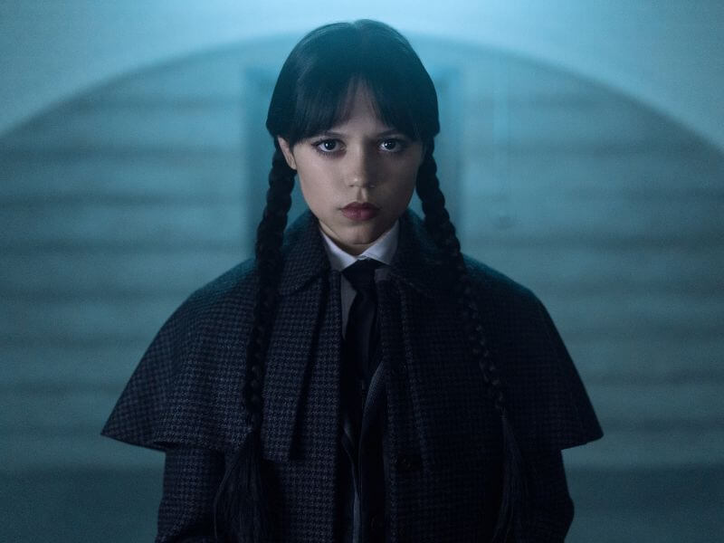 Wednesday Addams in her signature uniform