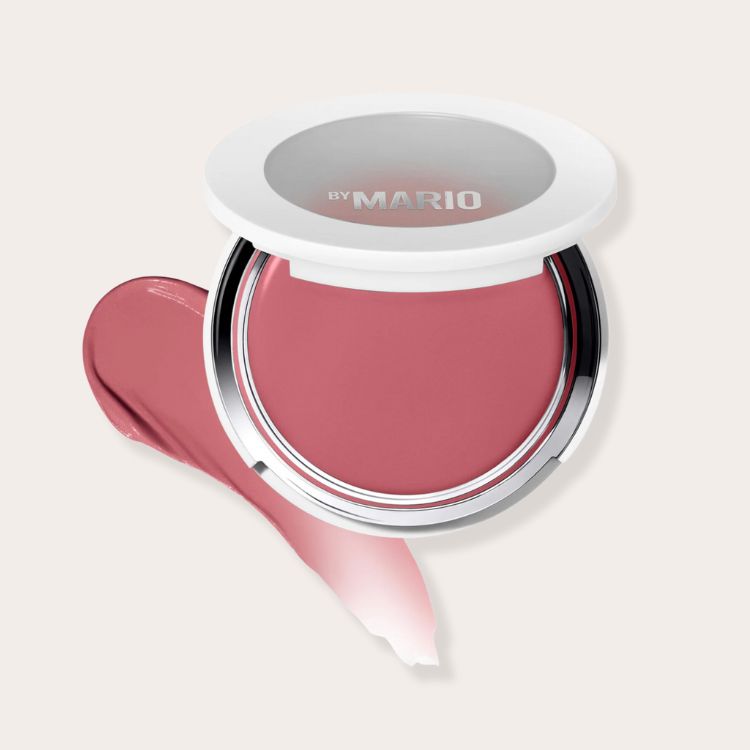 A compact of MAKEUP BY MARIO Soft Pop Plumping Blush Veil in a pink hue.