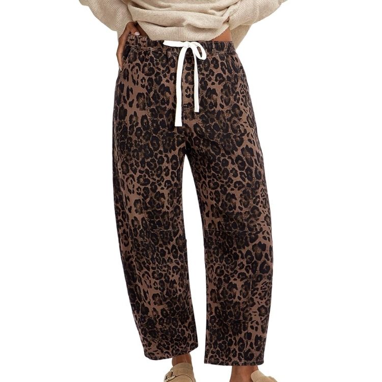 Leopard print jeans with a curved barrel leg silhouette
