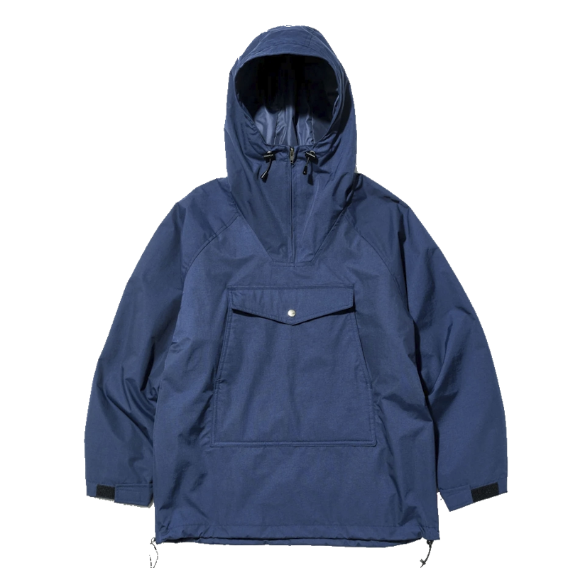 Close-up of utility pocket details and buckle hardware on a technical garment.