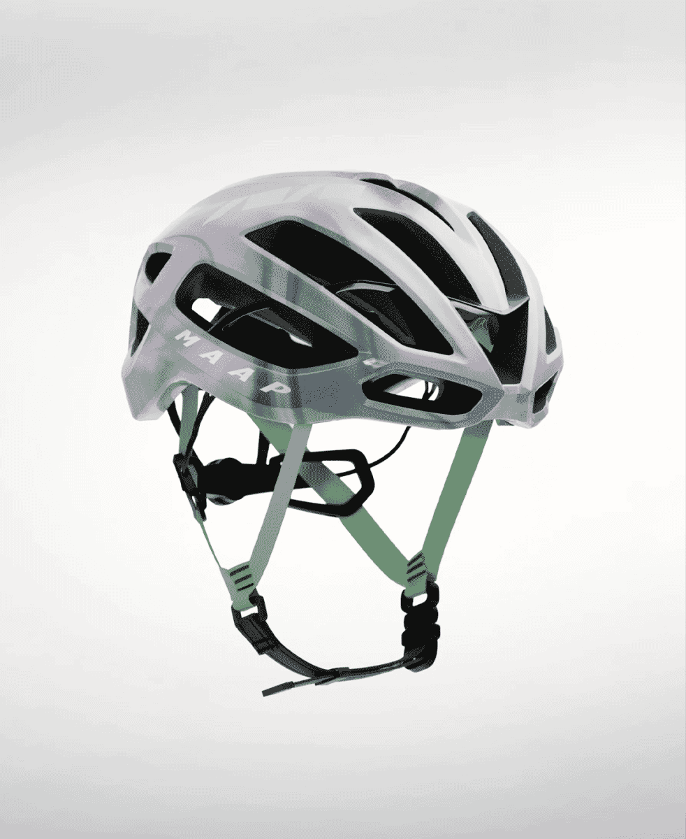 Side profile of a silver and matte gray MAAP cycling helmet featuring high-visibility green straps.