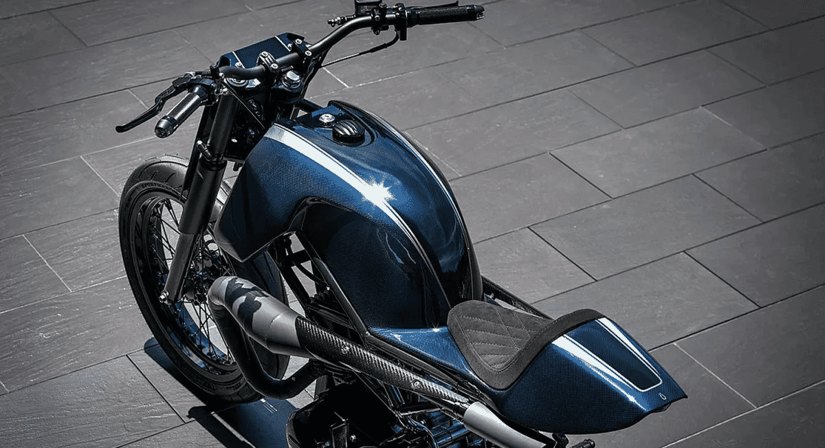 The vibrant blue carbon fiber custom motorcycle with white racing stripes in a final showcase shot.