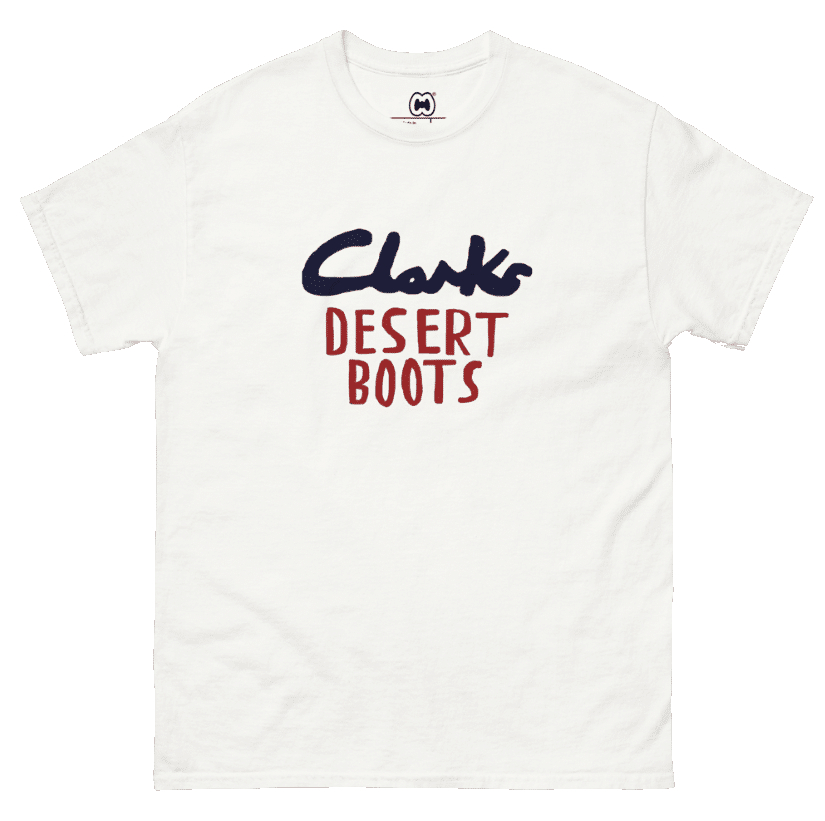 A white short-sleeve T-shirt with 'Clarks Desert Boots' graphic text.