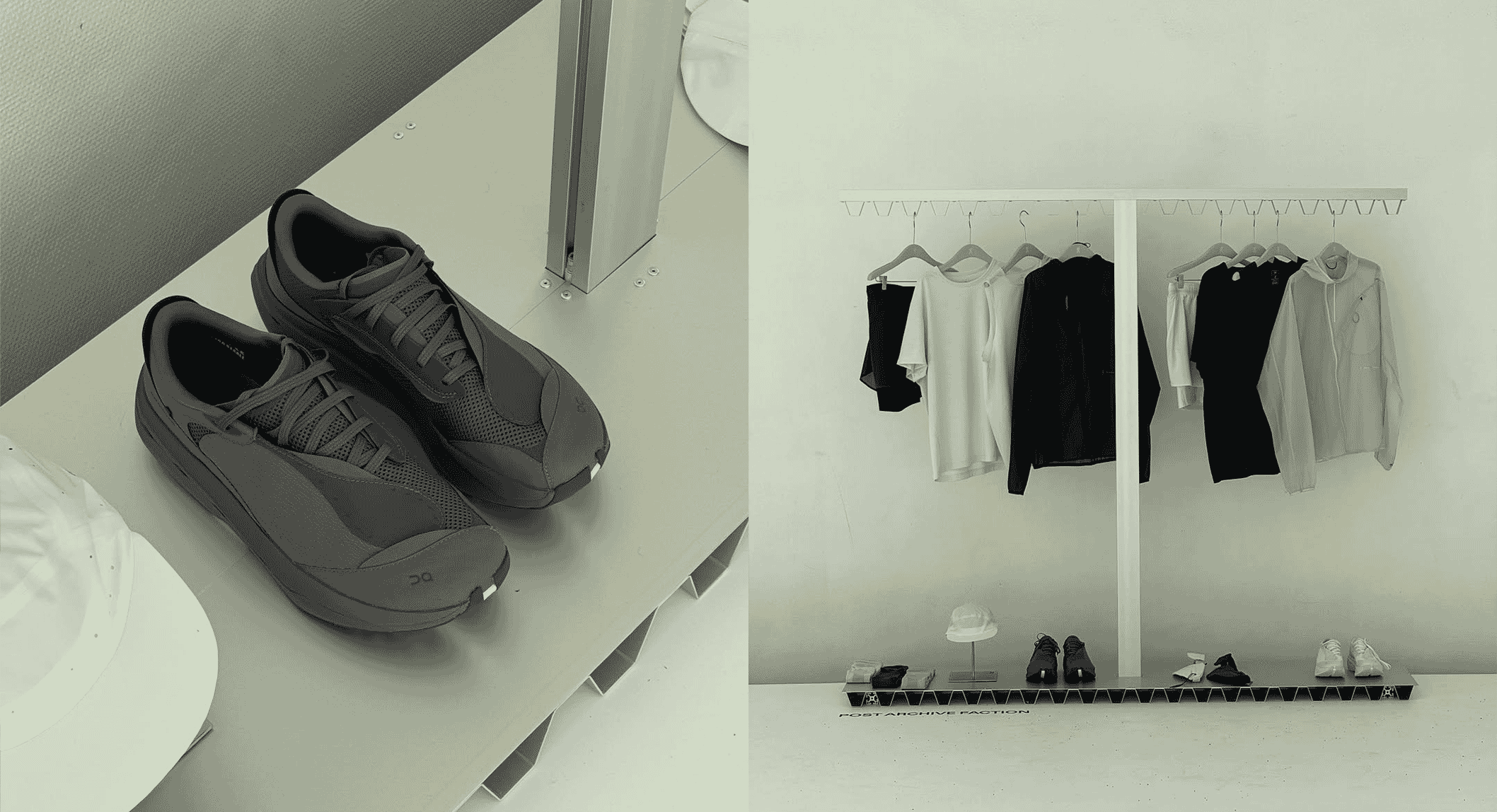 Wide shot of the minimalist monochrome apparel and sneaker display.