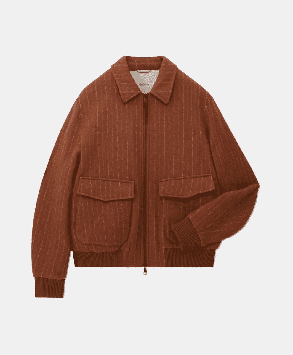 Flat lay of a brown pinstriped wool jacket with a front zipper and ribbed hem.