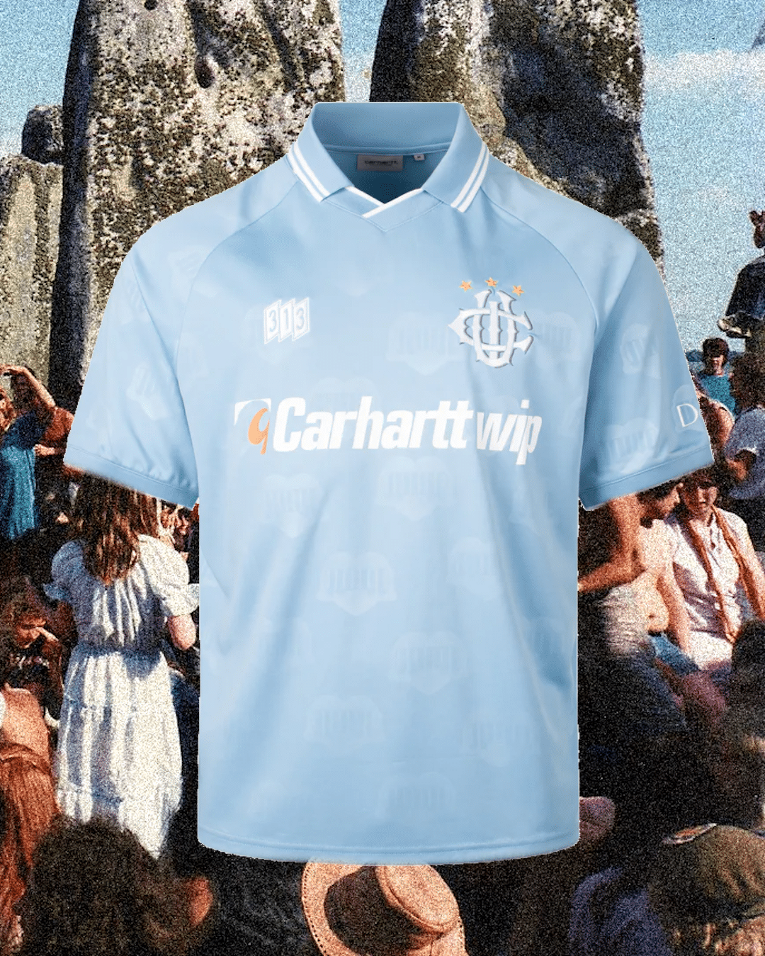 Light blue Carhartt WIP football jersey with a club crest displayed against a retro festival backdrop.