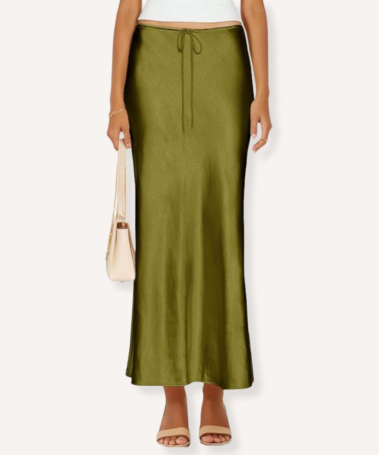 A flowing satin maxi skirt in a vivid chartreuse shade.