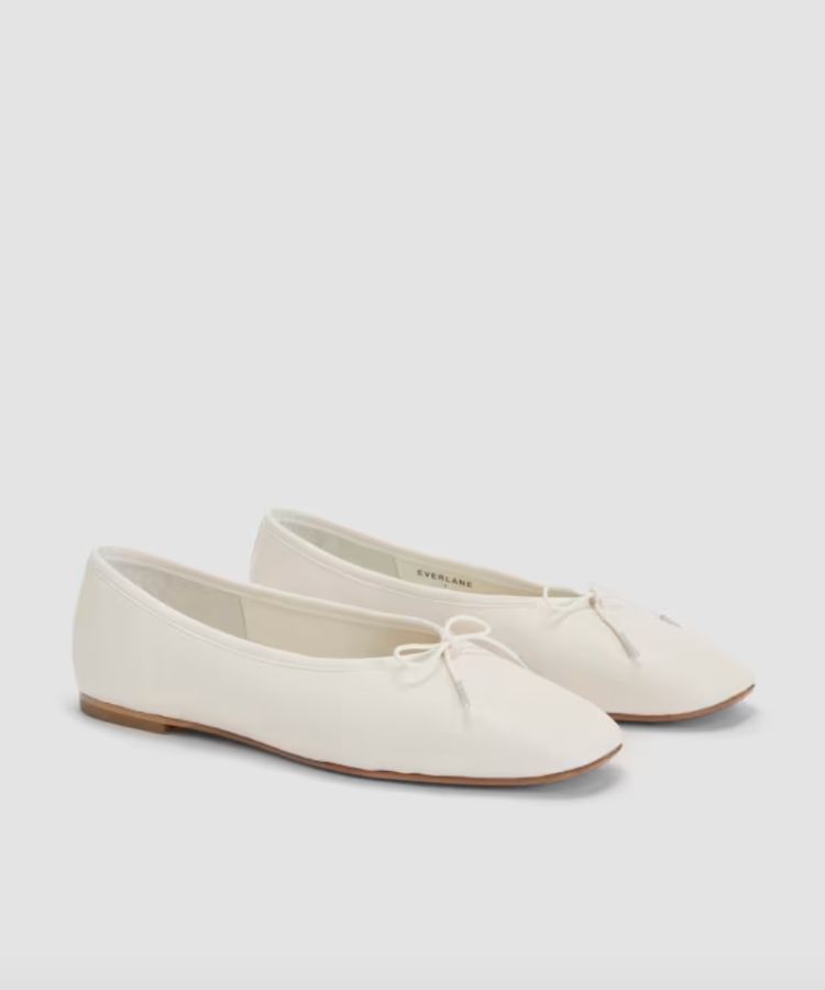 Black leather ballet flats by Everlane.