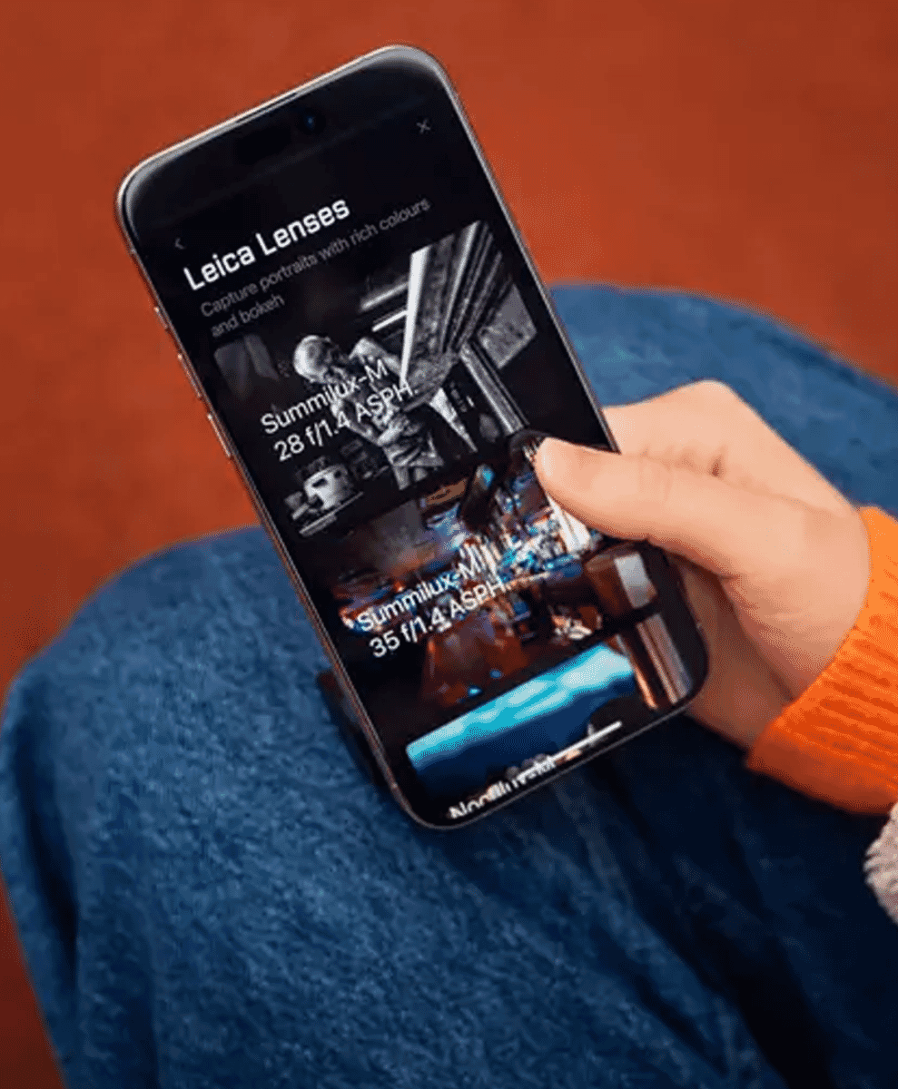 A smartphone screen displaying various Leica lens options like Summilux and Noctilux.