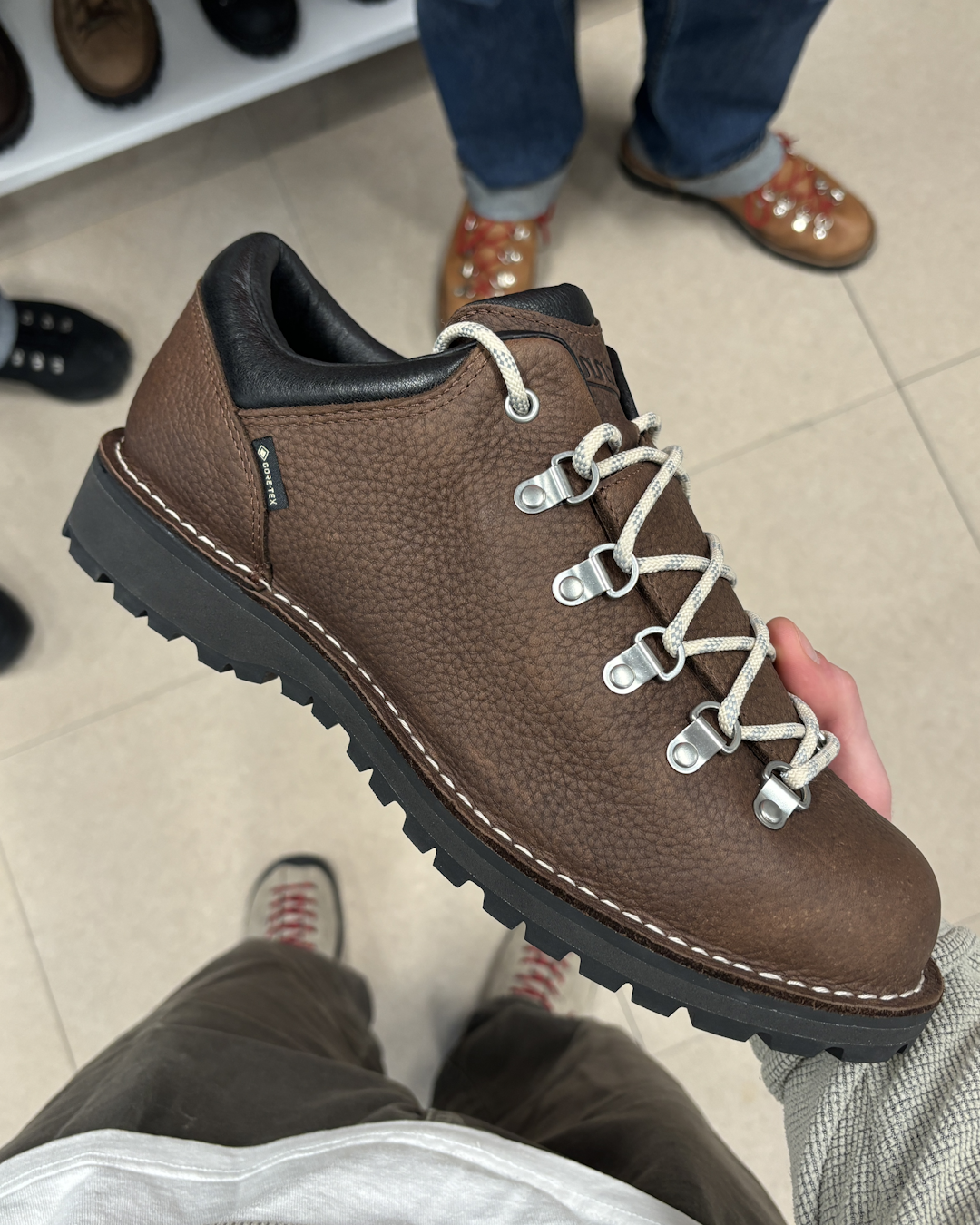 Sleek, all-black monochromatic silhouette of the CDG Homme Plus x Nike Sense 96 SP sneaker.