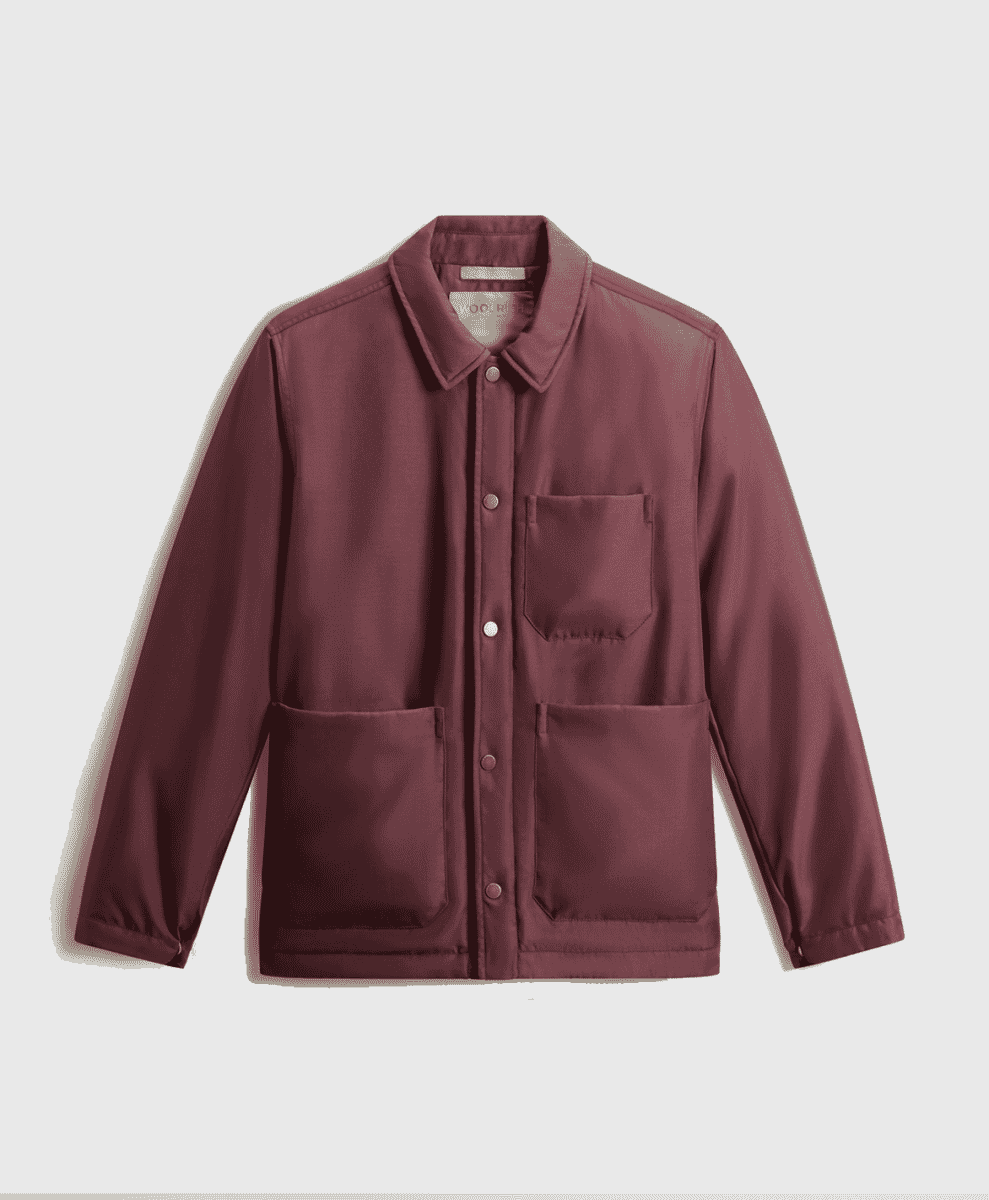 Flat lay of a burgundy work-style jacket with four patch pockets.