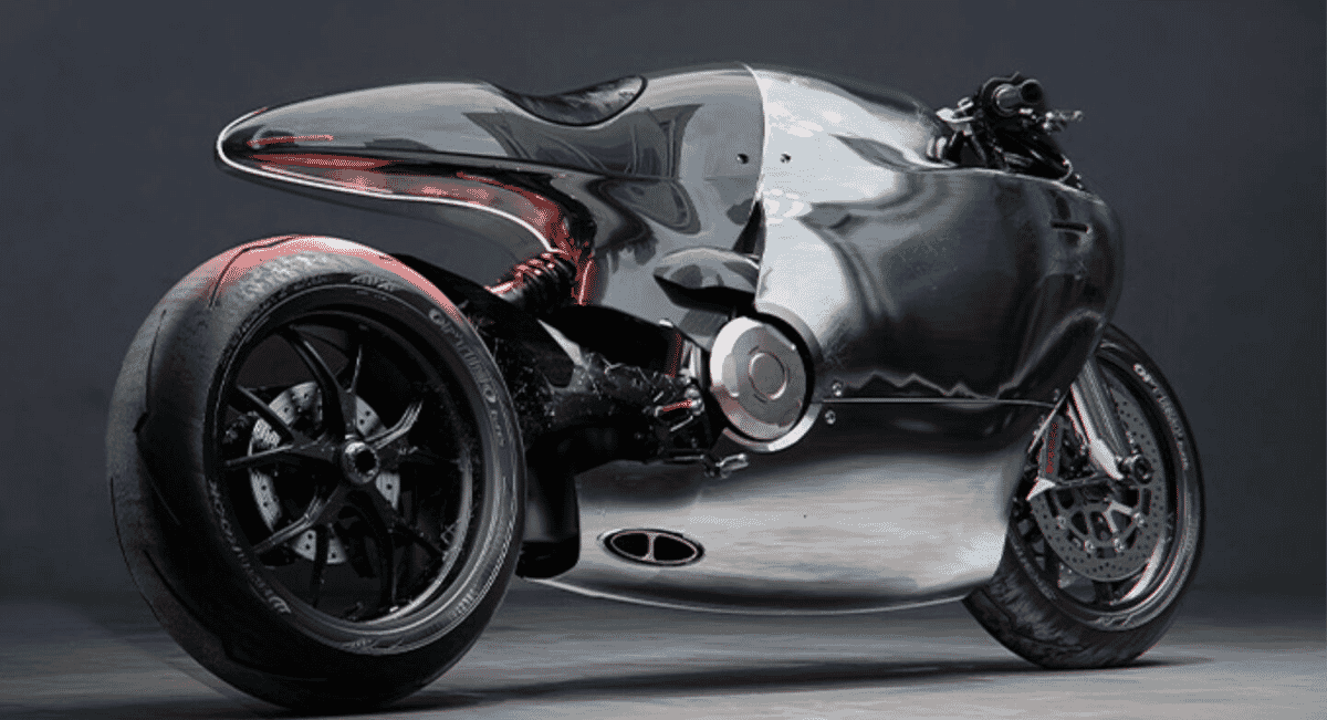 Minimalist studio shot of a chrome concept motorcycle reflecting its surroundings against a clean background.