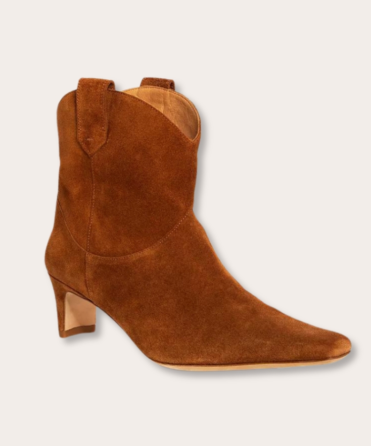STAUD western ankle boots with a clean, sculptural silhouette.