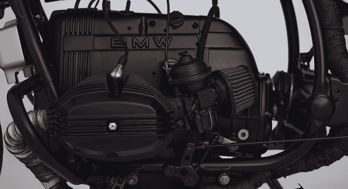 Close-up detail of a BMW boxer engine with industrial black powder coating.